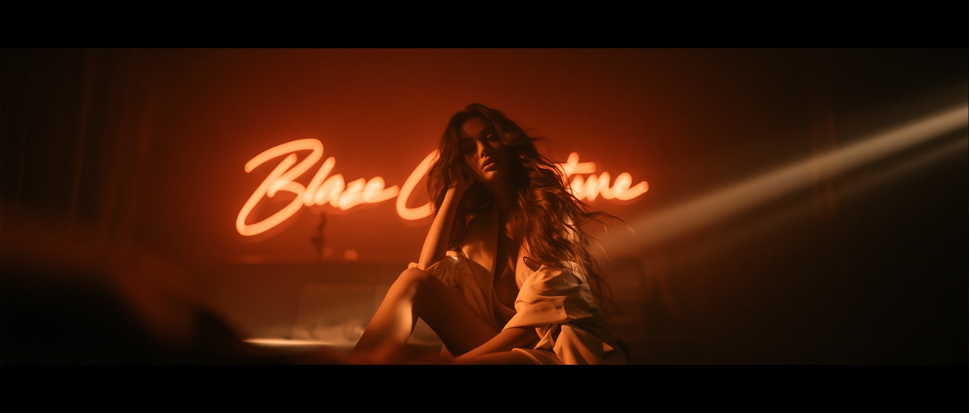 Cinematic amber still from a Blaze Creative shoot