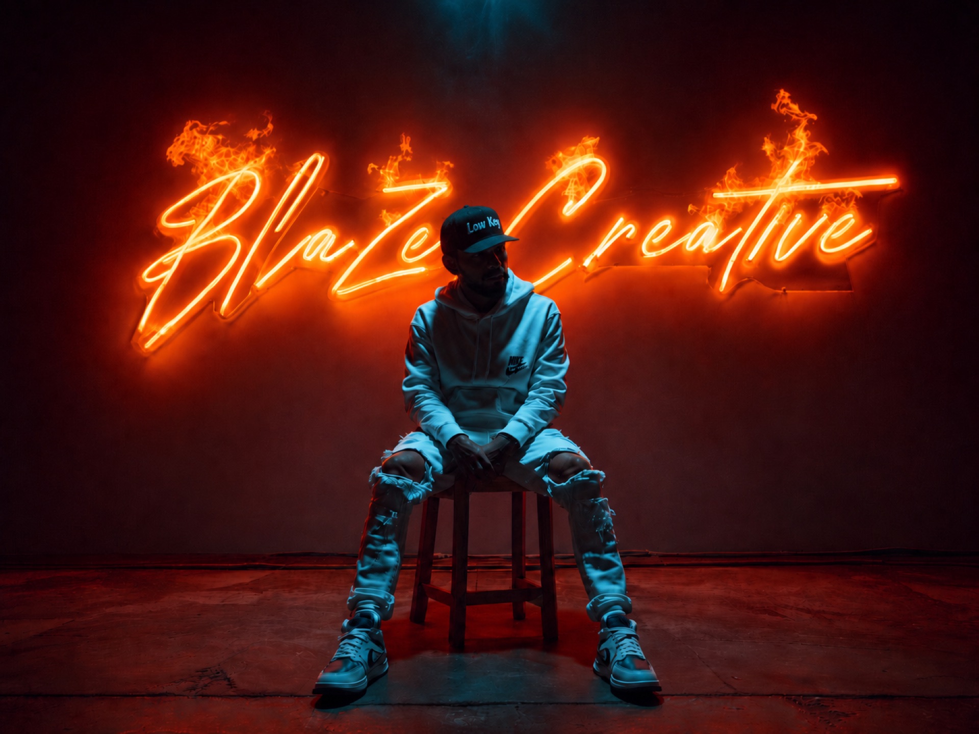 Portrait under a burning Blaze Creative neon